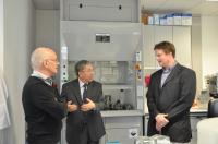 Prof. Burbach (left) receives a briefing from Prof. John Rudd (right) when visiting the Animals Holding Facilities accompanied by Prof. Chan Wai-yee (middle)